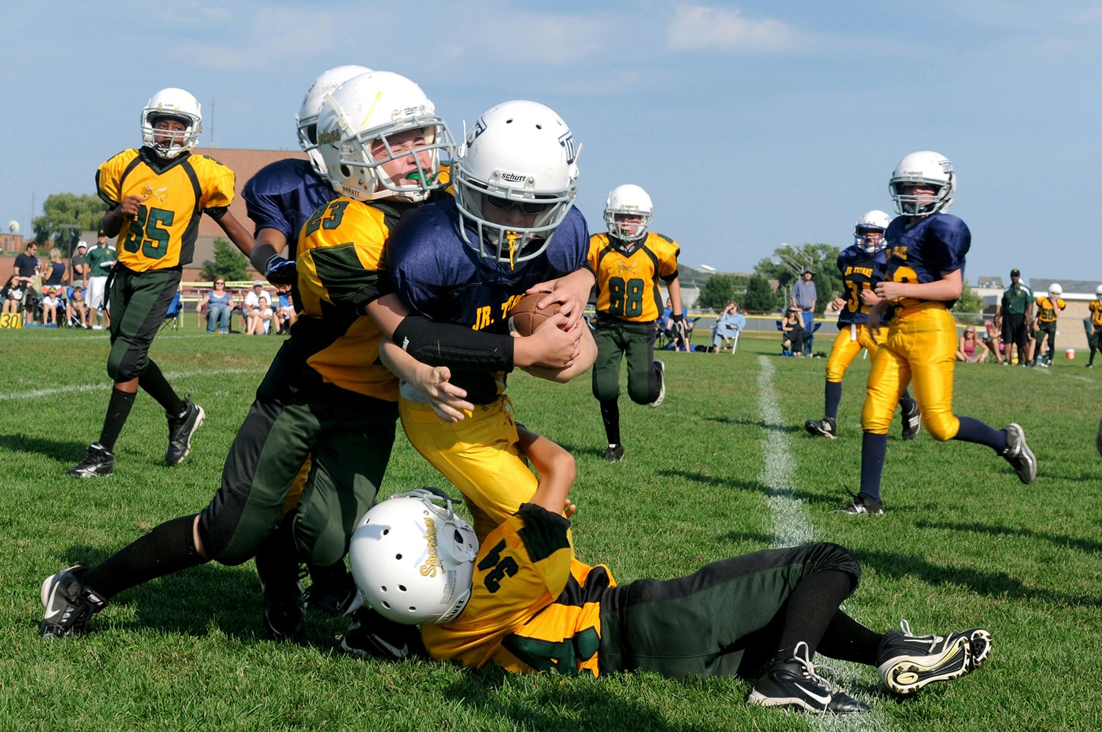 kids playing football